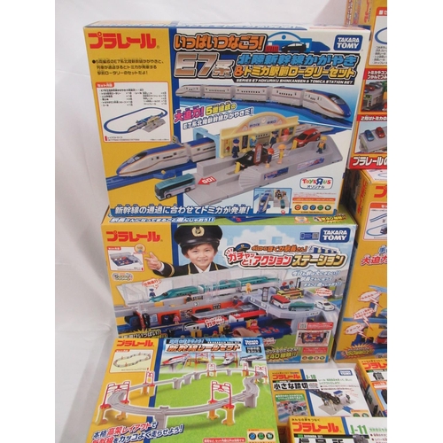 328 - 16 boxed Takara TOMY Japanese import boxed train stations and buildings, some opened some sealed, al... 