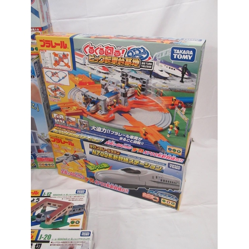 328 - 16 boxed Takara TOMY Japanese import boxed train stations and buildings, some opened some sealed, al... 