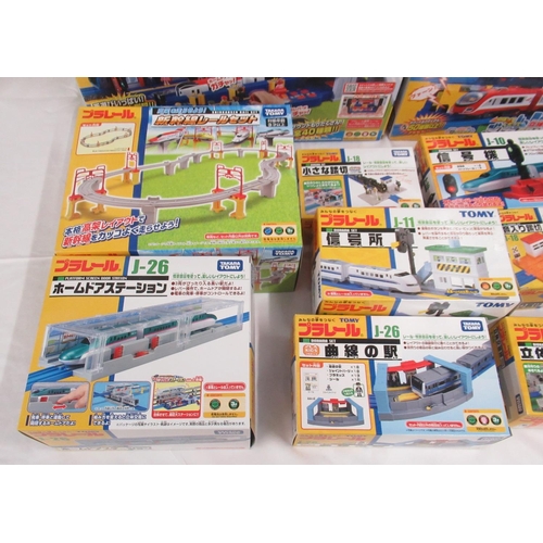 16 boxed Takara TOMY Japanese import boxed train stations and buildings some opened some sealed al