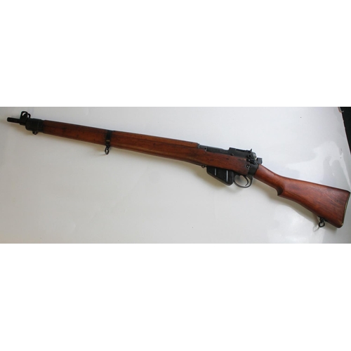 575 - Lee-Enfield. S.M.L.E Bolt Action rifle. 303 calibre Number 4 Mk 1, Dated 1943. This is a nice exampl... 