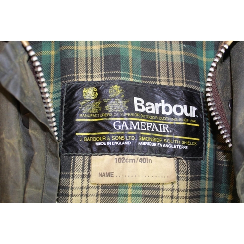 613 - Barbour Gamefair olive green wax jacket with tartan cotton lining, sizing C102cm/40