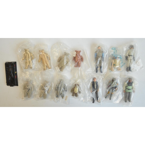 311 - Fourteen vintage Kenner Star Wars action figures from 1979 to 1984 to include Han Solo, Ewoks, R2-D2... 