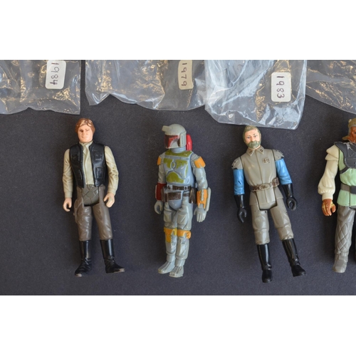 311 - Fourteen vintage Kenner Star Wars action figures from 1979 to 1984 to include Han Solo, Ewoks, R2-D2... 