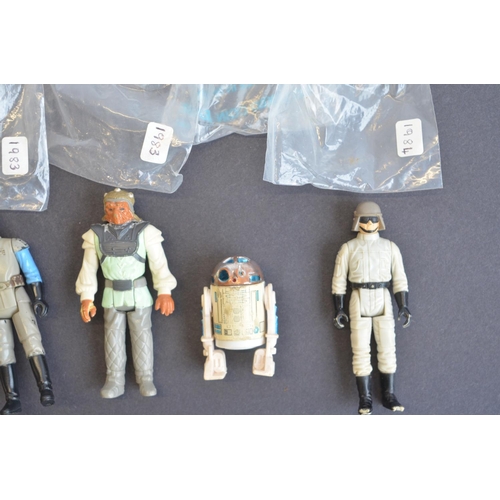 311 - Fourteen vintage Kenner Star Wars action figures from 1979 to 1984 to include Han Solo, Ewoks, R2-D2... 