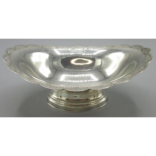 68 - 20th century silver bon bon dish with crimped wavey edge embossed with flower heads, and stepped ova... 