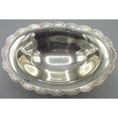 68 - 20th century silver bon bon dish with crimped wavey edge embossed with flower heads, and stepped ova... 