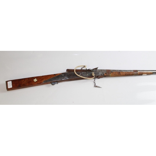 529 - C19th Miquelet musket. Steel Barrel and lock, copper banding bone inlay to Butt. Overall length 50in... 