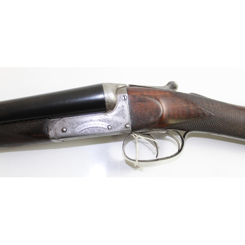 532 - Army and Navy 12 bore Side by Side Shotgun. Fine Engraving to lock. Double trigger Ejector. Barrel L... 