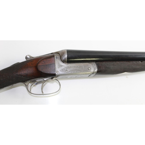 532 - Army and Navy 12 bore Side by Side Shotgun. Fine Engraving to lock. Double trigger Ejector. Barrel L... 