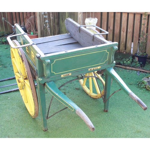 1200 - Late C19th/early C20th North Eastern Railway 2 wheeled hand cart, painted in green and yellow livery... 