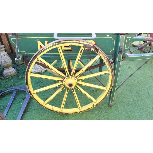 1200 - Late C19th/early C20th North Eastern Railway 2 wheeled hand cart, painted in green and yellow livery... 