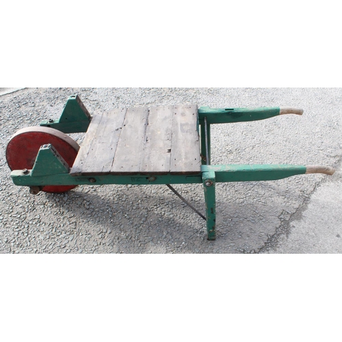 1202 - C20th 'King & Co. Carriers' one wheeled sleeper barrow, painted in green, a/f, painted red wheel sur... 