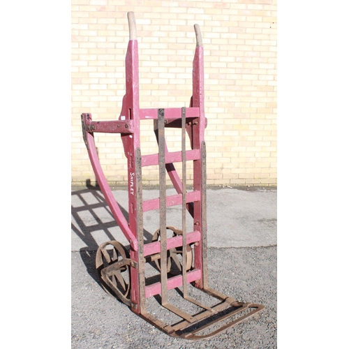 1207 - C20th 'Shipley' painted red heavy duty 2 wheeled luggage hand cart, L183cm W61cm H52cm, metal rack 5... 