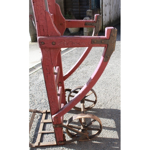 1207 - C20th 'Shipley' painted red heavy duty 2 wheeled luggage hand cart, L183cm W61cm H52cm, metal rack 5... 