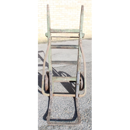 1210 - C20th 'Stainforth & Hatfield' painted green two wheeled heavy duty porters trolley, L153cm W55cm H42... 