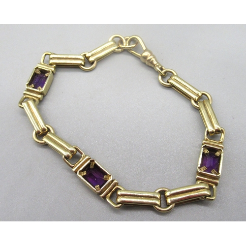 10 - 9ct yellow gold fancy link bracelet set with three emerald cut amethysts, with dog clip clasp, stamp... 