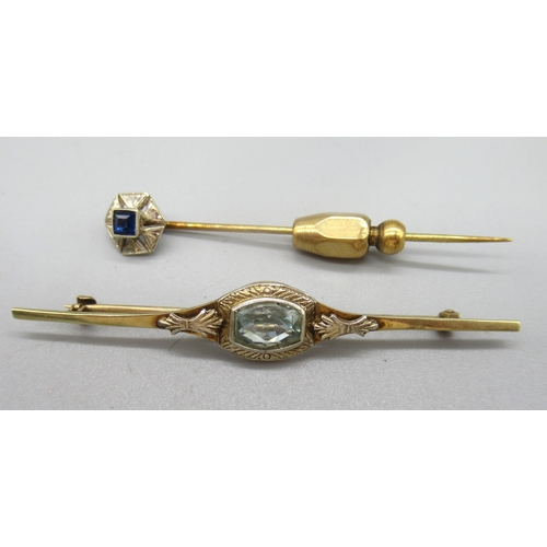 46 - 10ct yellow gold bar brooch set with pale blue stone, and a yellow metal tie pin with 14ct white gol... 