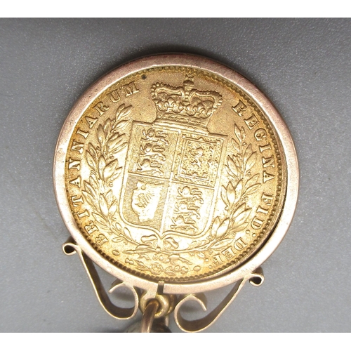 8 - Victorian 1870 sovereign in 9ct yellow gold mount, stamped 9ct, on hallmarked Sterling silver double... 