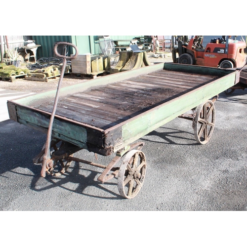 1214 - C20th 4 wheeled leaf sprung rail cart, with cast wheels 2 small 2 big, single handle pulley, L275cm ... 