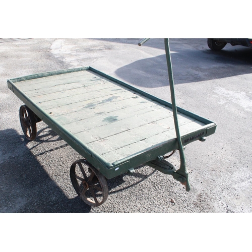 1216 - C20th N.E.R. 4 wheeled train cart, with sprung rear axle, double handled pulley, cast plaque 'NER127... 