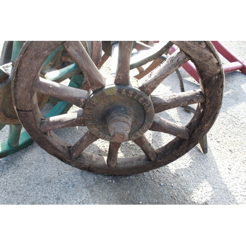 1221 - 'H.H.Lull Gds. Pellon Halifax 2-12' 2 wheel bale cart, set of coopered wheels on axle with frame Nor... 