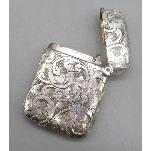 60 - Hallmarked Sterling silver vesta with foliage detail, initials 