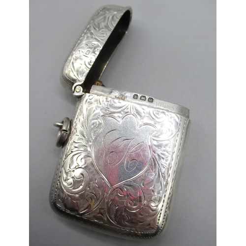 60 - Hallmarked Sterling silver vesta with foliage detail, initials 