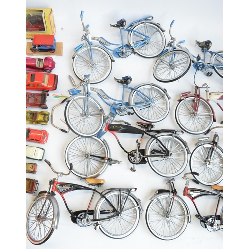 212 - Collection of model vehicles, bicycles and aircraft to include large scale metal and plastic bike mo... 