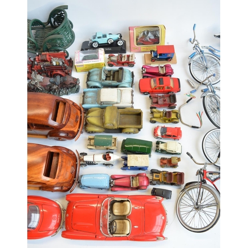 212 - Collection of model vehicles, bicycles and aircraft to include large scale metal and plastic bike mo... 