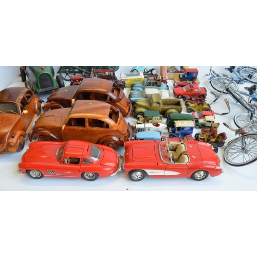 212 - Collection of model vehicles, bicycles and aircraft to include large scale metal and plastic bike mo... 