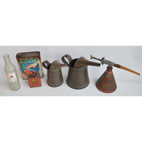 283 - Collection of vintage oil cans and other items to include an oiler with sprung action oil nozzle, ha... 