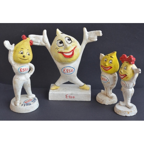 286 - Four cast iron Esso coin bank figurines by M Busch Gmbh to include Frau Tropf etc.