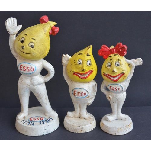 286 - Four cast iron Esso coin bank figurines by M Busch Gmbh to include Frau Tropf etc.