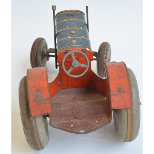 213 - Vintage tinplate lithographed clockwork tractor model, marked Made In Great Britain but no makers ma... 