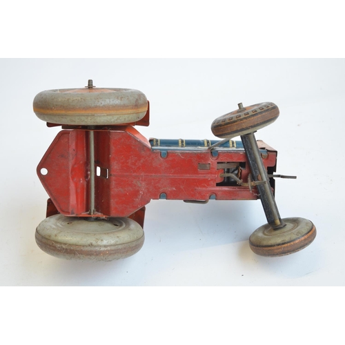 213 - Vintage tinplate lithographed clockwork tractor model, marked Made In Great Britain but no makers ma... 