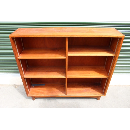 694 - Modern side cabinet with adjustable shelves glazed doors, on turned feet W122cm D30cm H194cm