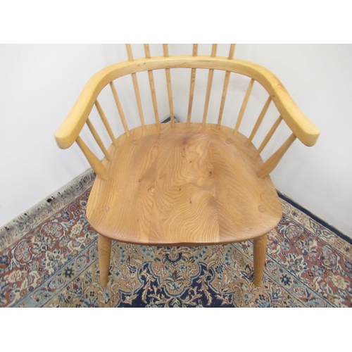 688 - Modern ash and elm comb back Windsor chair with cow horn arms and cushion