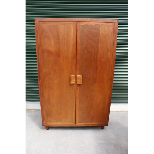 684 - Modern two-door cupboard with adjustable shelves, on turned feet W122cm D55cm H196cm