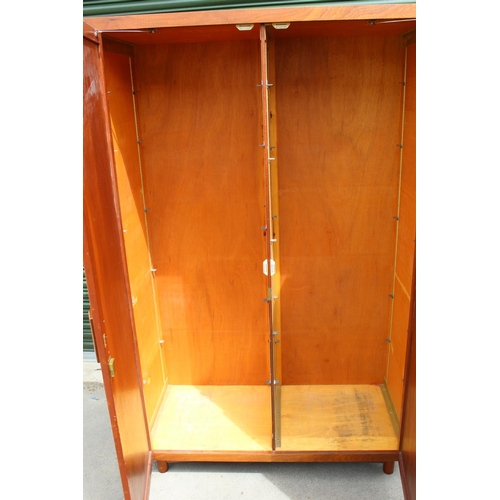 684 - Modern two-door cupboard with adjustable shelves, on turned feet W122cm D55cm H196cm