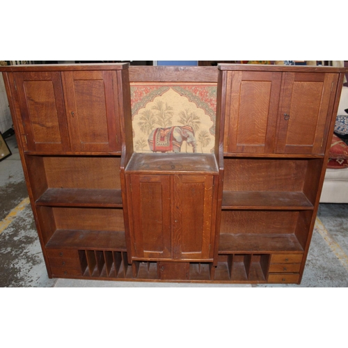 696 - Edwardian oak stationery cabinet, with four cupboards, six drawers and twelve compartments, W150cm D... 