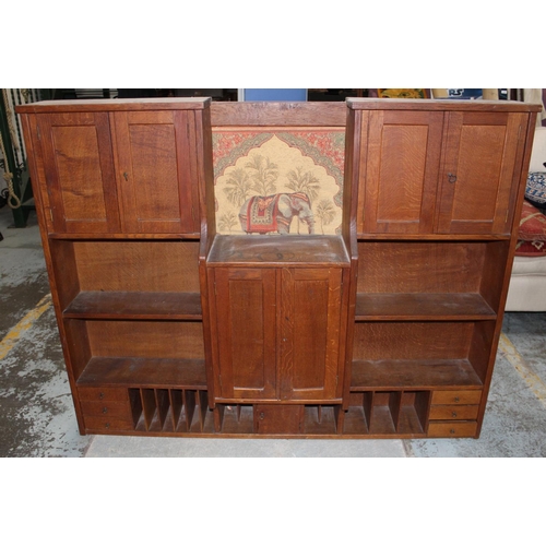 696 - Edwardian oak stationery cabinet, with four cupboards, six drawers and twelve compartments, W150cm D... 