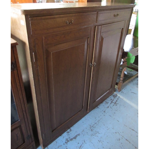 652 - Victorian grained as oak pine cupboard, two frieze drawers above a pair of fielded panel doors, with... 