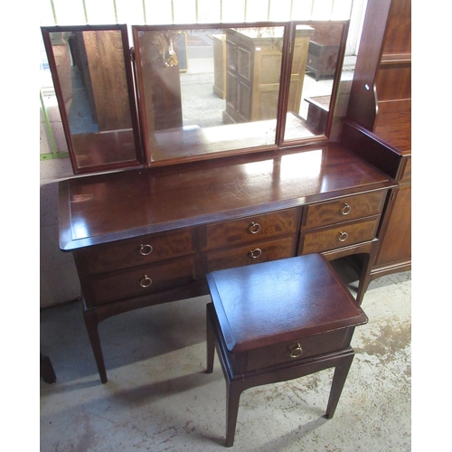 641 - Stag Minstrel bedroom furniture comprising; Two door wardrobe, dressing table, bedside cabinet and t... 