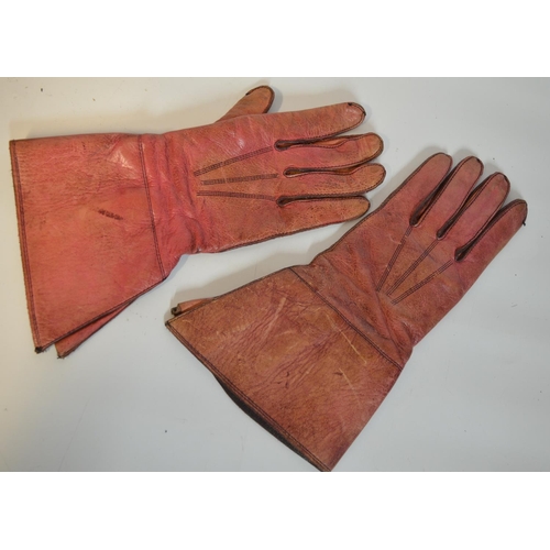 131 - Pair of vintage red leather unlined dispatch riders style gloves (stamped 1940, size 9 and a half), ... 