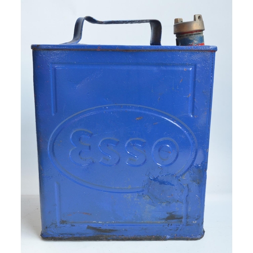 134 - Three vintage oil cans to include blue painted Esso and a Shell-Mex example (all with caps), 2 vinta... 