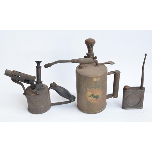 135 - Collection of vintage oil cans to include Shell Lubricants, a blow torch, fire extinguisher, extingu... 