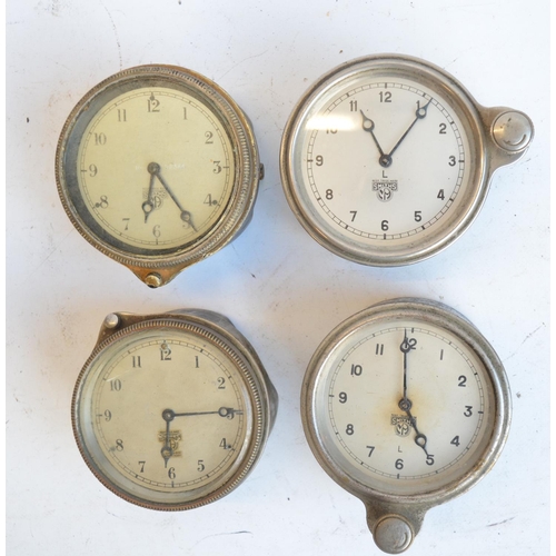 139 - Five vintage car clocks by Smiths to include a desktop mounted example, H21cm