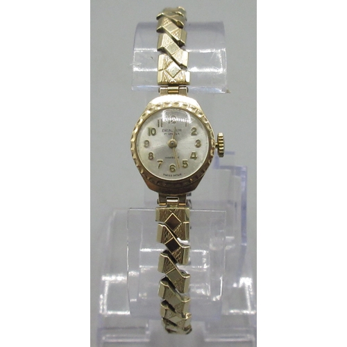 118 - Ladies Excalibur gold wristwatch on gold plated expanding bracelet, signed silvered sunburst Arabic ... 