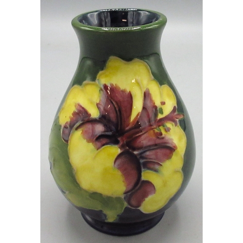 128 - Moorcroft Pottery: Hibiscus design vase, green ground, H9.5cm