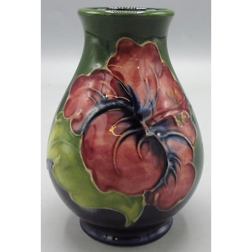 128 - Moorcroft Pottery: Hibiscus design vase, green ground, H9.5cm